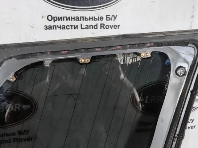 Стекло кузовное глухое левое Land Rover Sport L320
