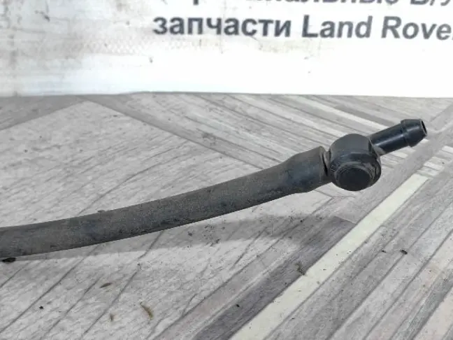 Форсунка фароомывателя левая Discovery 4 L319