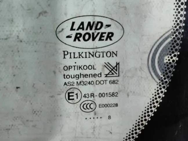 Стекло кузовное глухое левое DISCOVERY 3/4 L319