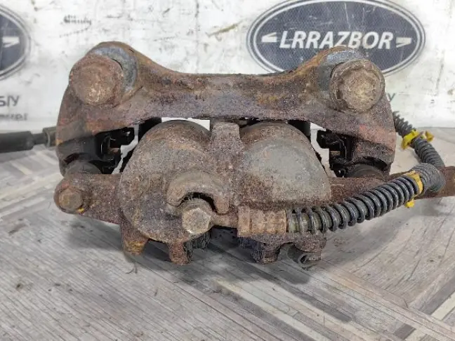 Суппорт тормозной передний правый DISCOVERY 3 L319