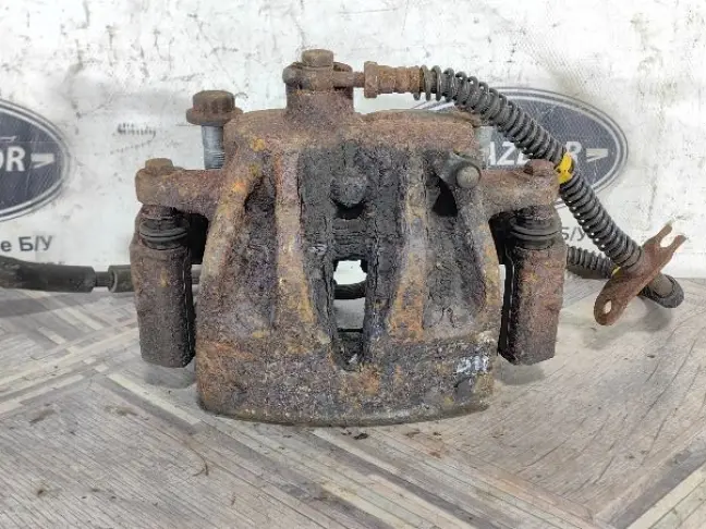 Суппорт тормозной передний правый DISCOVERY 3 L319