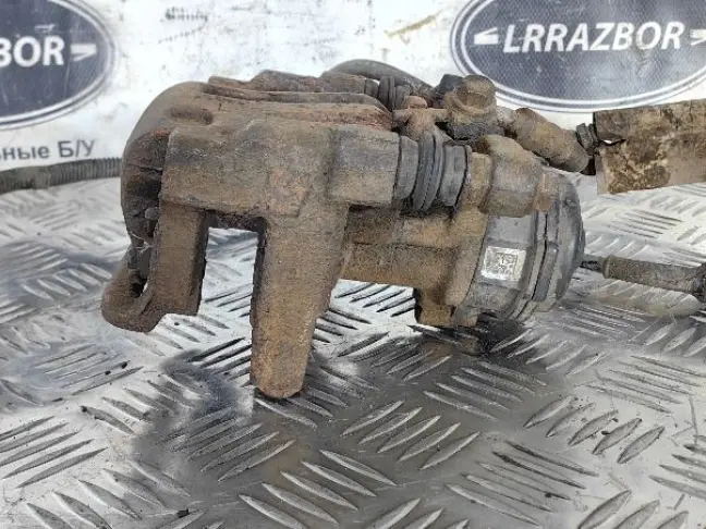 Суппорт задний левый Land Rover Freelander 2.2