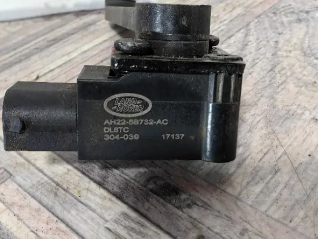 Датчик кузова задний DISCOVERY 4 L319 3.0