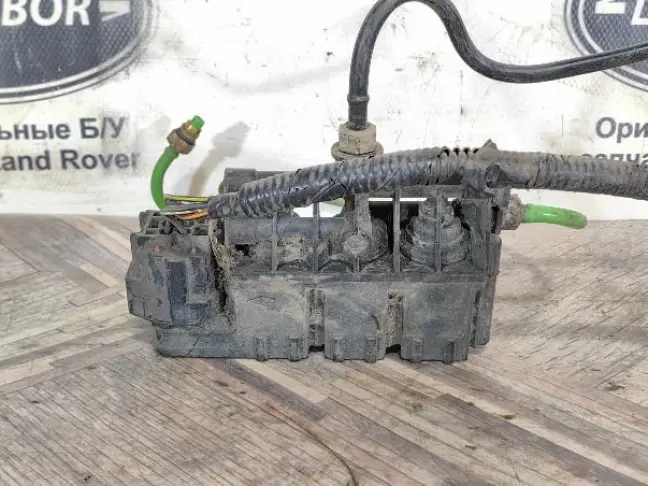 Блок клапанов задний DISCOVERY 3/4 L319 05-15