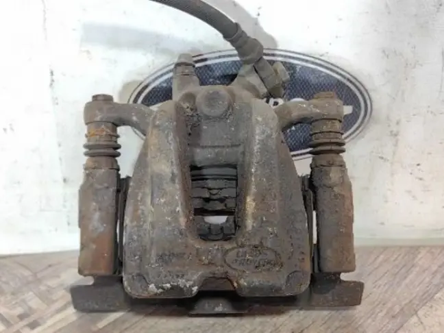 Суппорт задний левый Range Rover L322 5.0 4.4