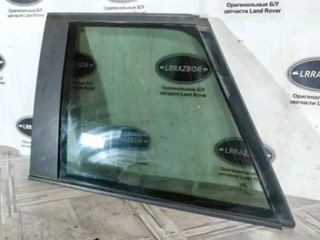 Стекло кузовное глухое левое Range Rover L322
