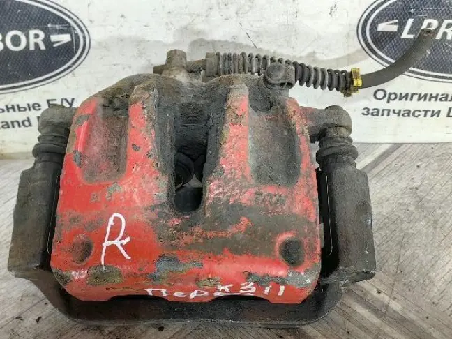 Суппорт тормозной передний правый DISCOVERY 3 L319