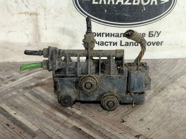 Блок клапанов задний DISCOVERY 3/4 L319 05-15