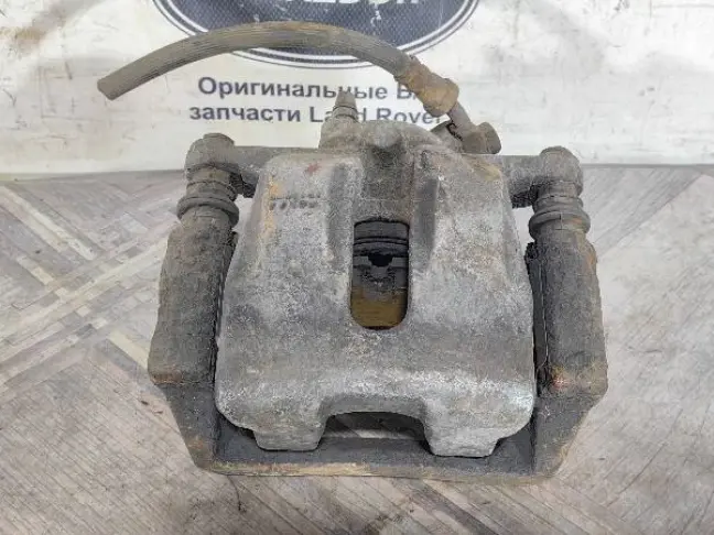 Суппорт левый задний Land Rover Sport L320