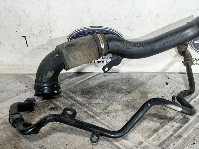 Патрубок турбины левый Range Rover Sport 3.0