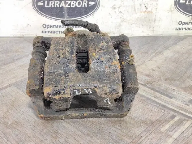 Суппорт левый задний Land Rover Sport L320