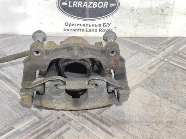 Суппорт левый передний Land Rover Freelander 2 2.2