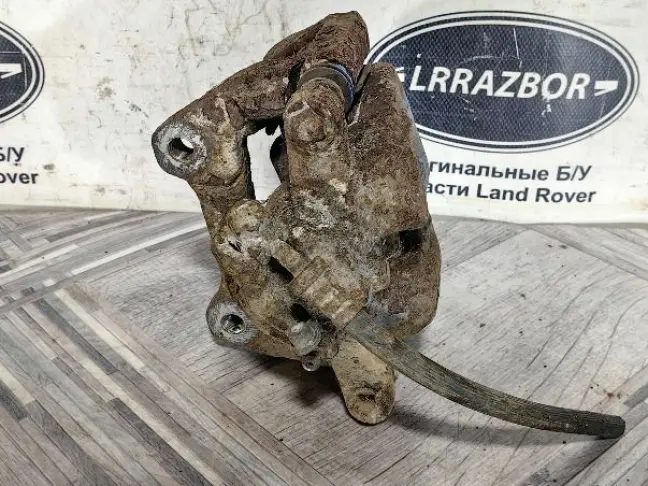 Суппорт левый задний Land Rover Sport L320