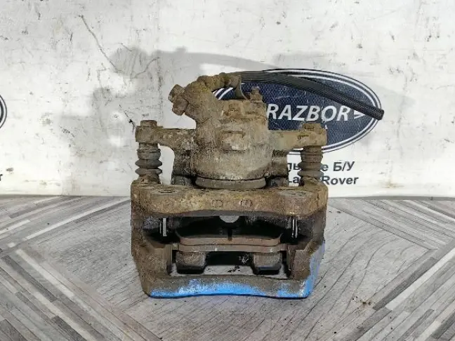Суппорт левый задний Land Rover Sport L320