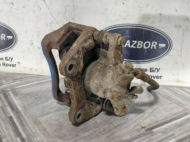 Суппорт левый задний Land Rover Sport L320