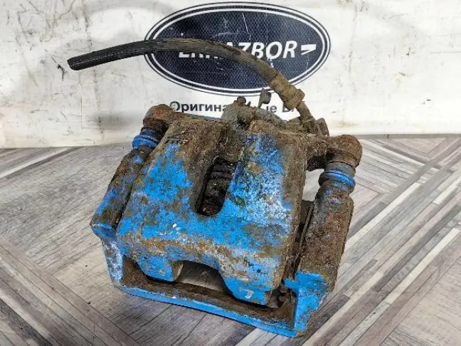 Суппорт левый задний Land Rover Sport L320