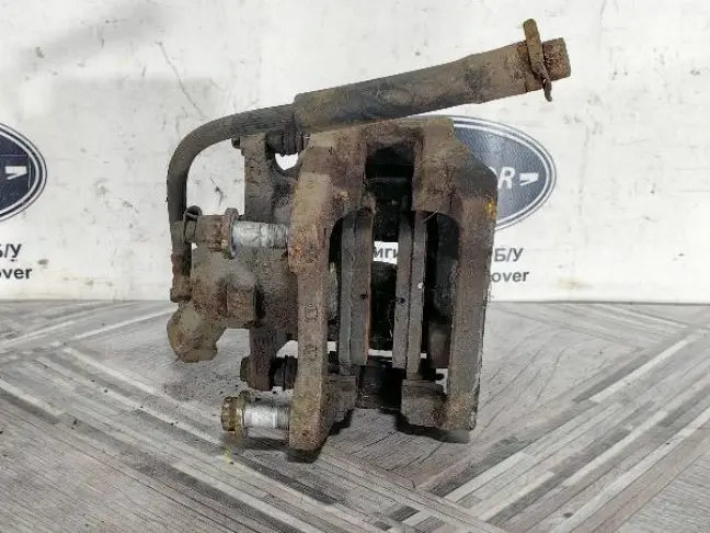 Суппорт левый задний Land Rover Sport L320