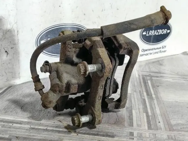 Суппорт левый задний Land Rover Sport L320