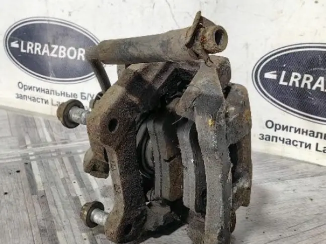 Суппорт левый задний Land Rover Sport L320