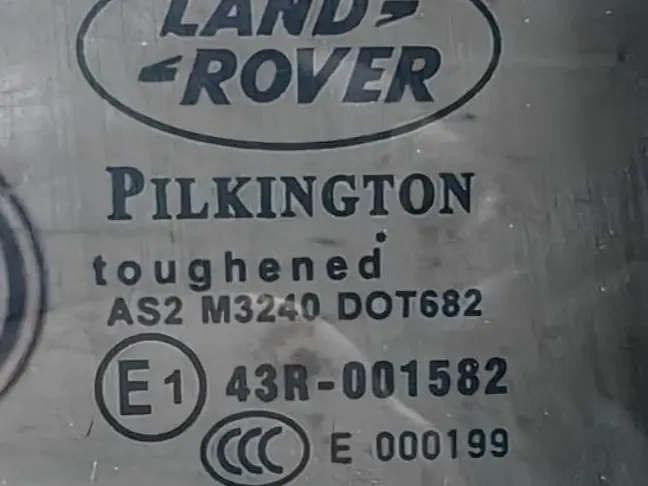 Стекло двери заднее левое Land Rover Freelander 2