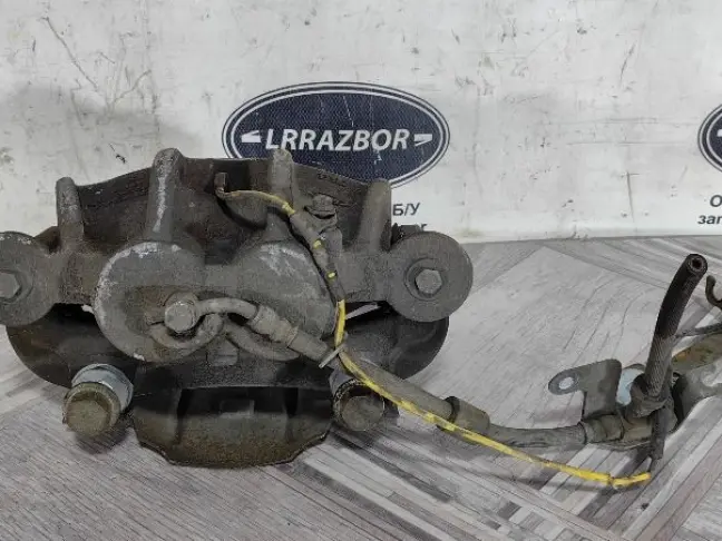 Суппорт передний левый Range Rover Sport 2