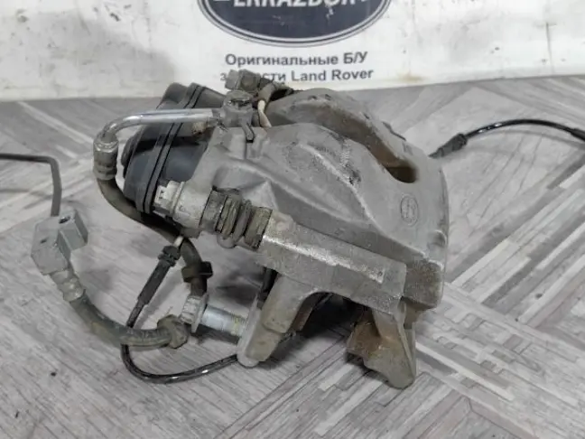 Суппорт задний правый Discovery 5 L462 3.0