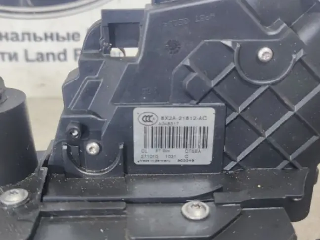 Замок двери передний правый Sport L320 09-12