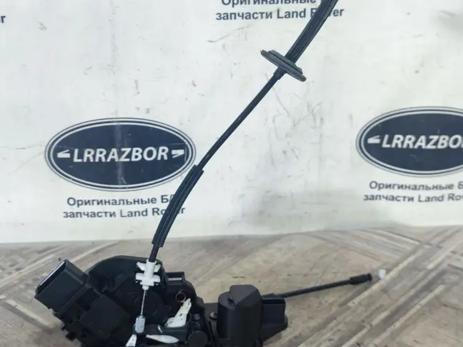 Замок двери передний правый Sport L320 09-12