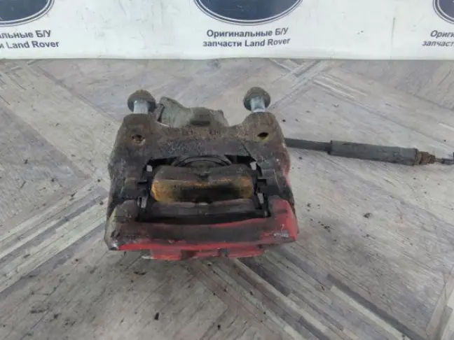 Суппорт левый задний Land Rover Sport L320