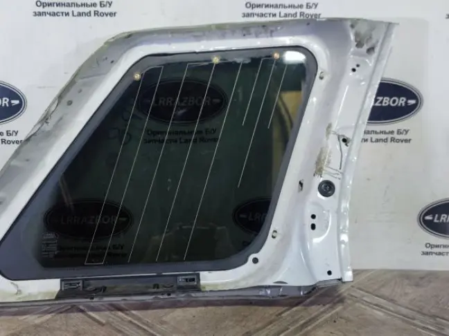 Стекло кузовное глухое левое Land Rover Sport L320