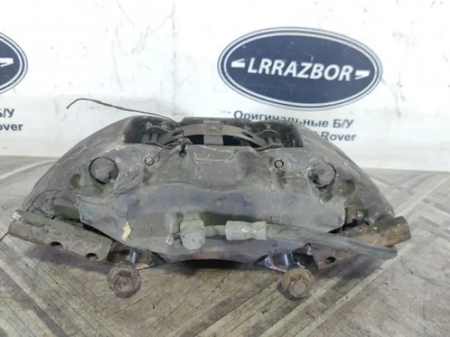 Суппорт левый передний Range Rover 3 L322