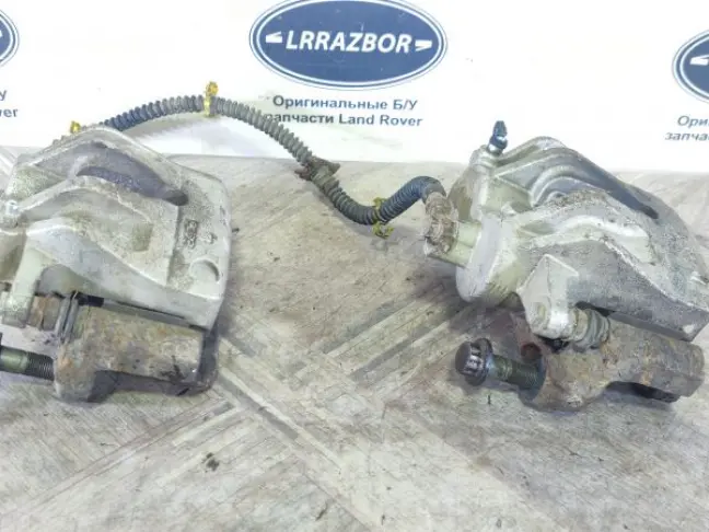Суппорт тормозной передний пара DISCOVERY 3 L319