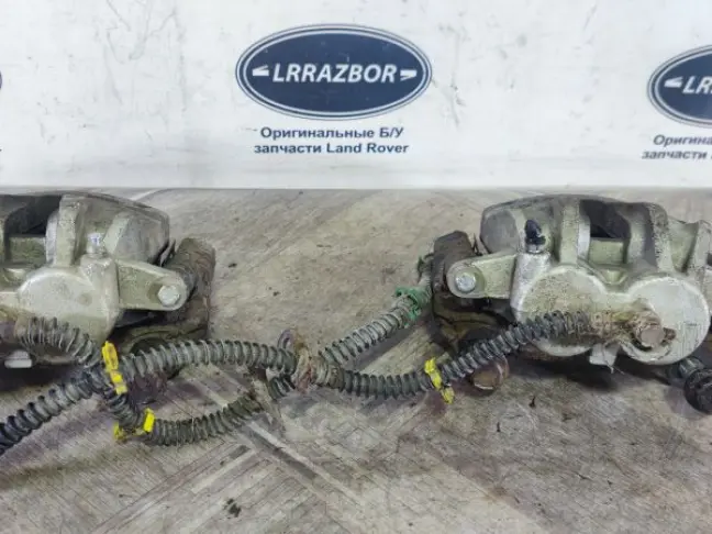 Суппорт тормозной передний пара DISCOVERY 3 L319