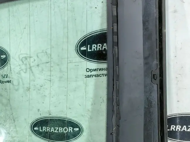 Стекло кузовное глухое левое Range Rover L322
