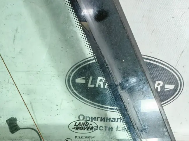 Стекло кузовное глухое левое Range Rover L322