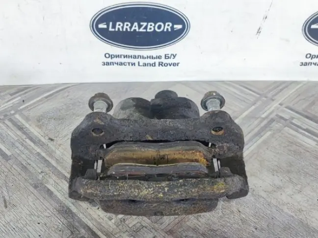Суппорт тормозной передний правый DISCOVERY 3 L319