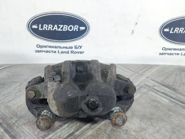 Суппорт тормозной передний правый DISCOVERY 3 L319
