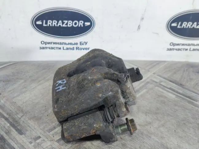 Суппорт тормозной передний правый DISCOVERY 3 L319