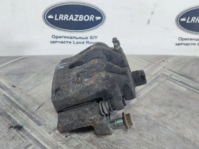 Суппорт тормозной передний левый DISCOVERY 3 L319