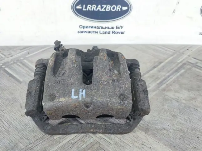 Суппорт тормозной передний левый DISCOVERY 3 L319