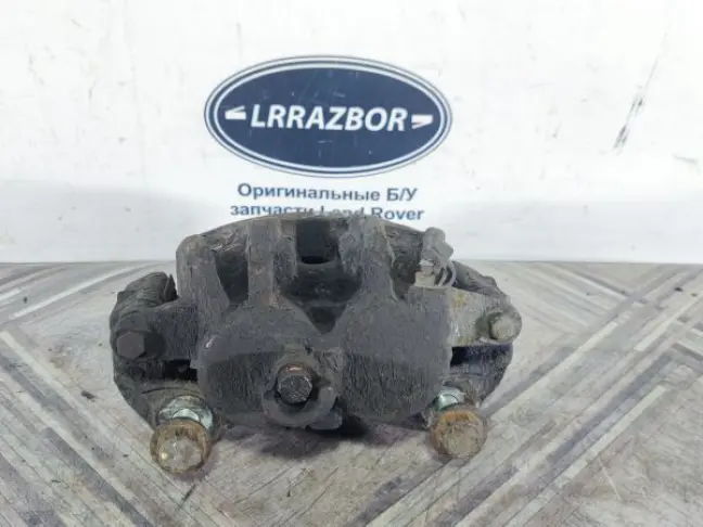 Суппорт тормозной передний левый DISCOVERY 3 L319