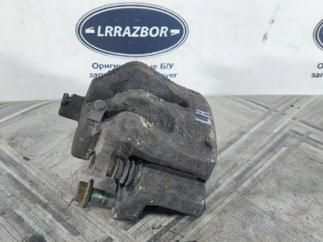 Суппорт тормозной передний левый DISCOVERY 3 L319