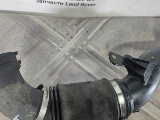 Патрубок турбины левый Range Rover Sport 3.0