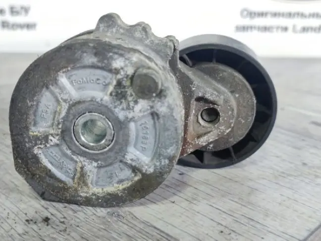 Натяжитель ремня с роликом Freelander 2 2.2