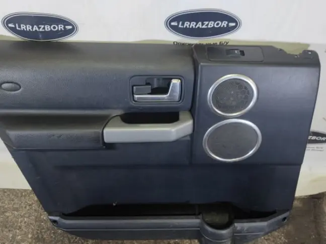 Обшивка двери левая перед DISCOVERY 3 L319 05-09