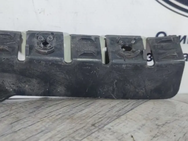 Кронштейн заднего бампера левый DISCOVERY 3 L319