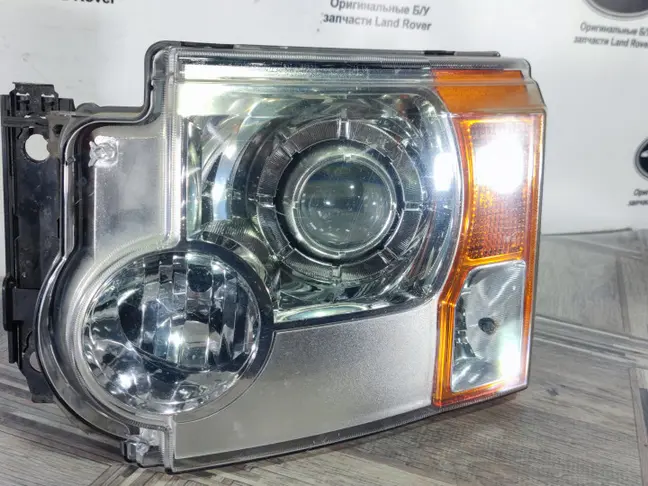 Фара левая адаптивная DISCOVERY 3 L319 05-09