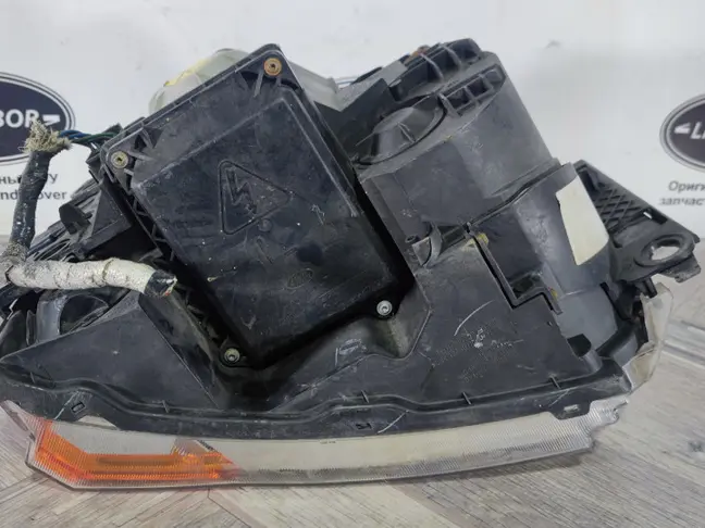 Фара левая адаптивная DISCOVERY 3 L319 05-09