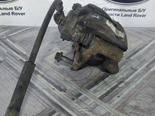 Суппорт левый задний Land Rover Sport L320
