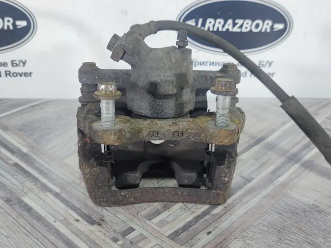 Суппорт левый задний Land Rover Sport L320